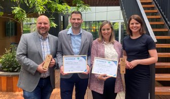 People standing holding the 2024 European Sustainable Healthcare Awards