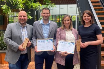 People standing holding the 2024 European Sustainable Healthcare Awards